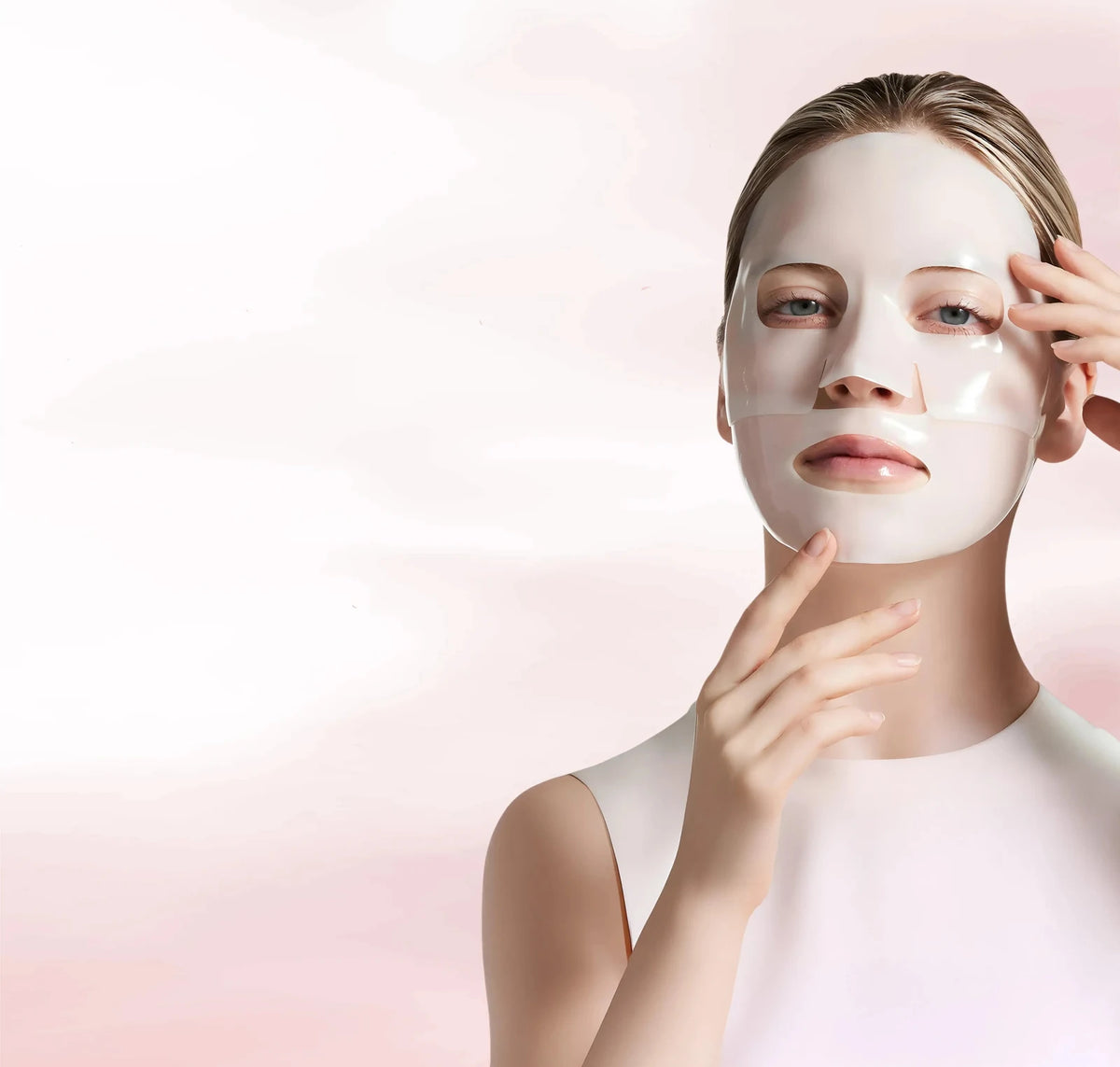 A woman adjusting a two-piece hydrogel face mask